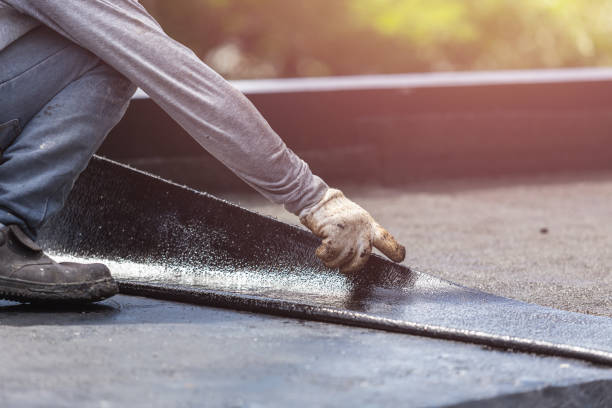 Professional Basement Waterproofing technician working in Leon, VA